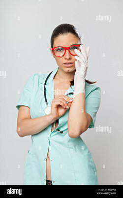 sexy-woman-doctor-with-a-stethoscope-and-red-glasses-on-white-background-KXRAXW.jpg