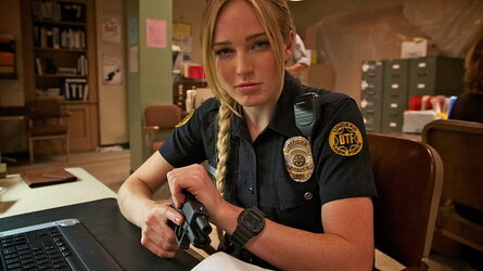 caity-lotz-blonde-police-glock-17-wallpaper-preview.jpg